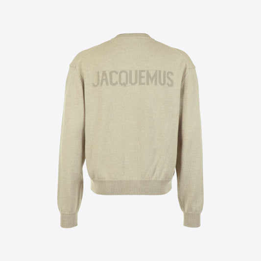 Cardigan beige knoop